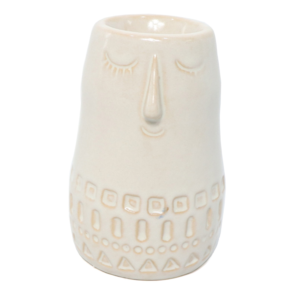 Porcelain face candle holder